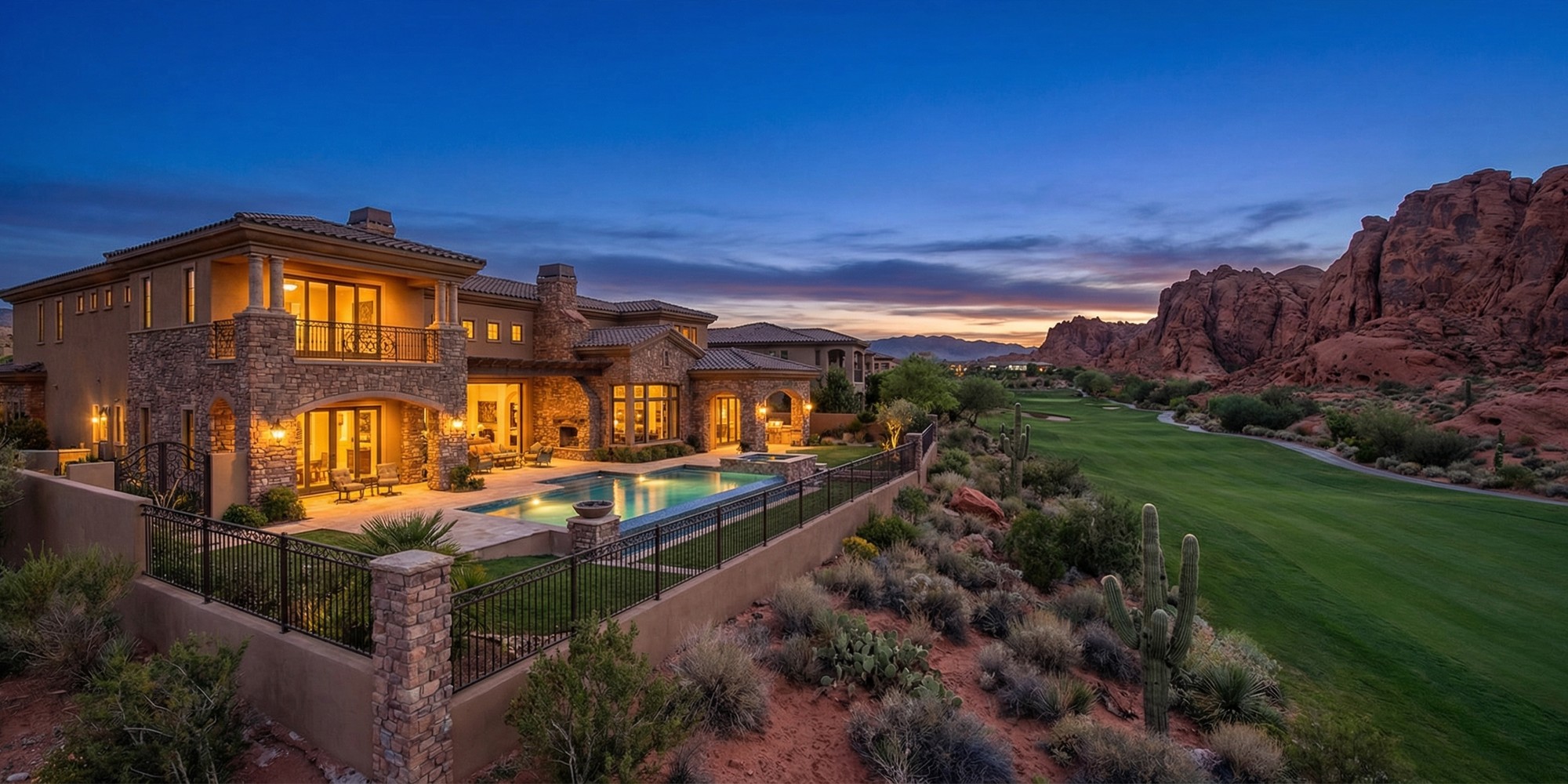 Luxury estate home at The Ridges Summerlin backing a golf course fairway with Red Rock Canyon formations in the distance